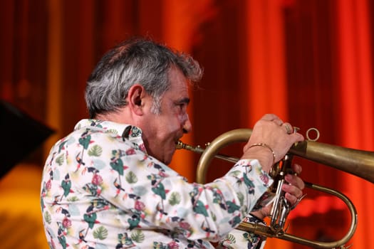 Cracow, Poland - July 4, 2022: Adam Baldych Quartet and Paolo Fresu live on stage of  Krakow Philharmonic at Summer Jazz Festival in Cracow, Poland