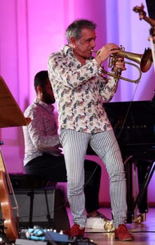 Cracow, Poland - July 4, 2022: Adam Baldych Quartet and Paolo Fresu live on stage of  Krakow Philharmonic at Summer Jazz Festival in Cracow, Poland