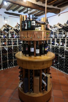 Montalcino, Italy - September 12, 2022: Interior of a wine shop in Montalcino ,Tuscany, Italy. Montalcino is famous for its Brunello di Montalcino wine.