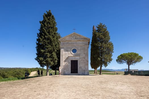 Pienza, Italy - September 12, 2022: Capella Di Vitaleta in countryside between San Quirico and Pienza in Val d Orcia Tuscany. Italy