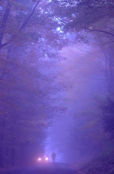 Car pulled over on a foggy evening in Hanover, New Hampshire, USA.