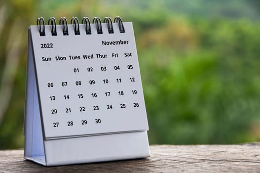 September month calendar with blurred nature background. Copy space