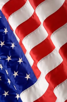 An American Flag flies high smbolizing freedom and patriotism.