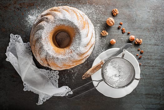 Potica, traditional Slovenian bread cake roll with walnuts. Sweet bread roll stuffed with walnuts and sprinkle with sugar