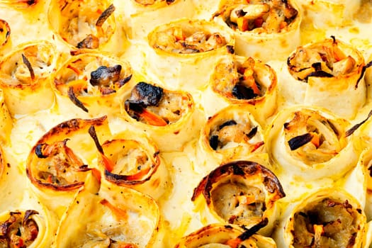 Vegetables baked with cheese in pita bread. Casserole. Close up