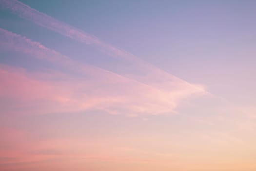 Pink and violet sunset clouds sky. Dream magic evening sky background