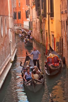 Gondolas floating down the canals of Venioce Italy.