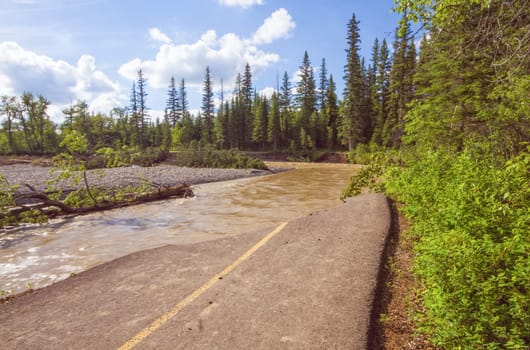 A destroyed pathway beside the Bow River from the Calgary 2013 flood.