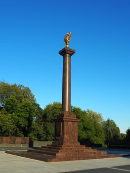 Petrozavodsk, Karelia, August 3, 2022 Monument-stele City of military glory, honorary title. Granite column with a bronze double-headed eagle. Pedestal on the alley of sister cities, Kirov Square.