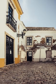 Faro, Portugal, September 2022: View on one of the cozy cobblestoned alleys of Faro in Portugal