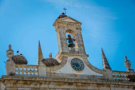 Faro, Portugal, September 2022: Detail view on the architecture of Arco da Vila in Faro, Portugal. Neoclassical arch which is the entrance to the old town.