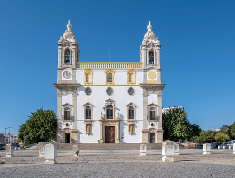 Faro, Portugal, September 2022: View on Igreja do Carmo, home of Capela dos Ossos de Faro or Chapel of Bones.