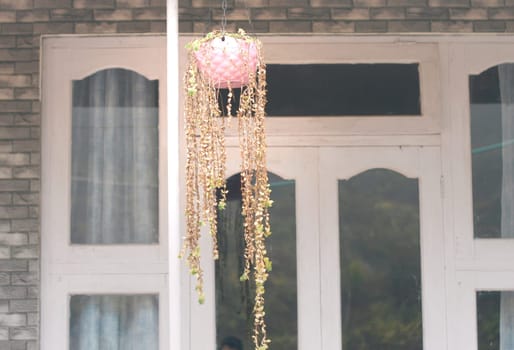 Light Hanging Lamp Planter with decorative flower in the house balcony