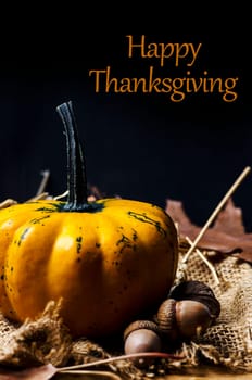 Thanksgiving dinner invitation card. Happy thanksgiving and give thanks concept. Autumn pumpkin and crops decorate thanksgiving dinner table.