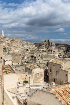 View of the Sassi di Matera a historic district in the city of Matera, well-known for their ancient cave dwellings. Basilicata. Italy