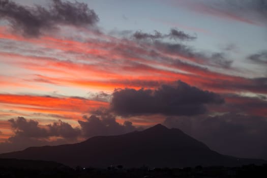 Magic sunset over Procida Island with Ischia island in the background.