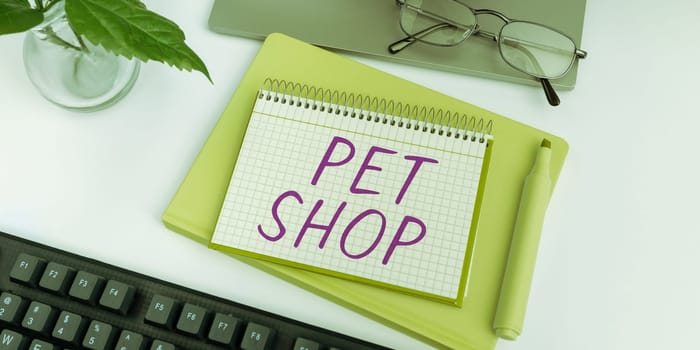 Conceptual caption Pet Shop, Business idea Retail business that sells different kinds of animals to the public