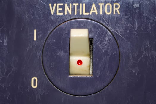 A switch for a fan to be able to turn it on and off.