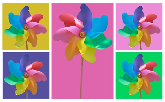 A plastic windmill with a wooden handle. Not a toy for children.