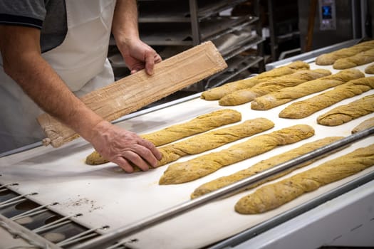 Tasted and fresh beautiful bread named french baguette ready to be cooked