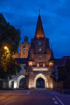 Famous medieval Kreuztor gate in Ingolstadt at night, Germany