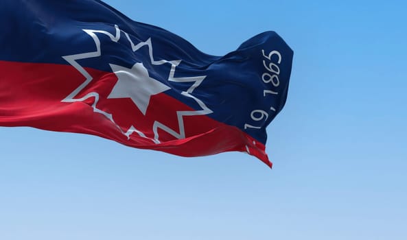 The Juneteenth flag waving in the wind. Juneteenth is a federal holiday in the United States commemorating the emancipation of enslaved African-Americans. Realistic 3d illustration. Rippled fabric.