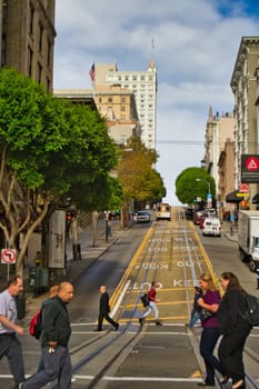San Francisco, USA, November 2013: Street view on historical cable car tracks in San Francisco, California, United States