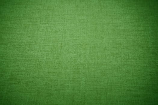 bright green linen fabric texture with vignette for the background.