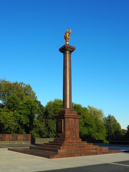 Petrozavodsk, Karelia, August 3, 2022 Monument-stele City of military glory, honorary title. Granite column with a bronze double-headed eagle. Pedestal on the alley of sister cities, Kirov Square.