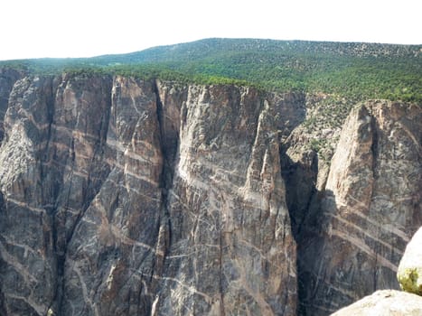 Greological time is shown in the layers of rock at Black Canyon National Park, Gunnerson, Colorado.