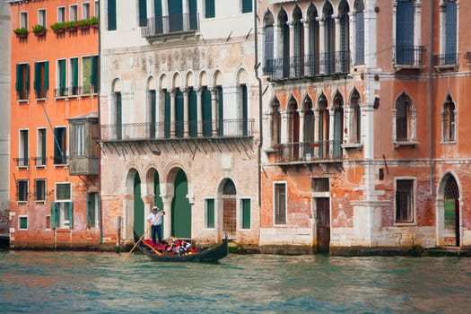 A gondola floats down the Grand Canal in Venice, Italy