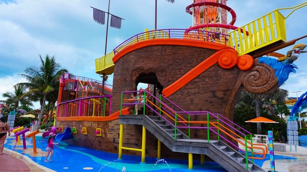 Coco Cay, Bahamas - April 29, 2022: People having fun at aquapark at Cococay, the island at Bahamas, where guests can spend the day having fun.