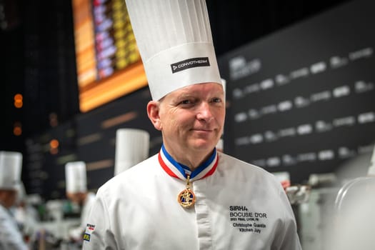 Lyon, Rhone Alpes Auvergne, France  january 22, 2023 : BOCUSE D'OR Lyon Eurexpo Sirha event 2023. The famous french chef Christophe Quentin portrait with sirha document. He is the jury member for the Bocuse d'or competition of the elite cookers in the world.