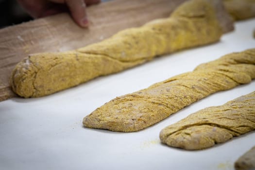 Tasted and fresh beautiful bread named french baguette ready to be cooked
