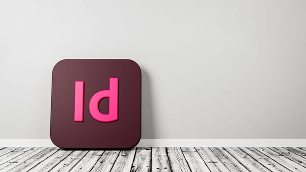 Adobe Indesign App Icon 3D Symbol Shape on Wooden Floor Against Gray Wall with Copy Space 3D Render Illustration