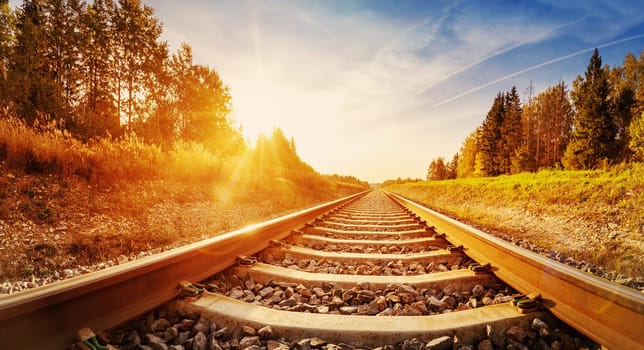 Perspective view of the railroad in countryside. Concept of the shipment, logistic and transportation.
