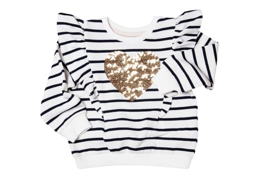 Spring and autumn children clothes. Close-up of a stylish beautiful black and white striped little girl sweater or pullover with a heart isolated on a white background. Kids winter or summer fashion.