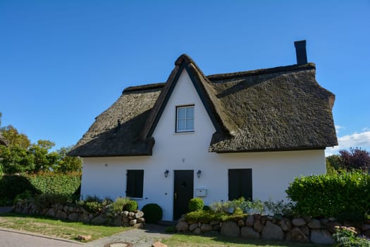 House with thatched roof on the Baltic Sea near Timmendorf Strand, Germany, Europe