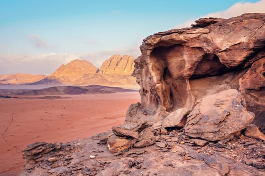 Red sandstone rocks formations in Wadi Rum also known as Valley of the Moon desert, Jordan.