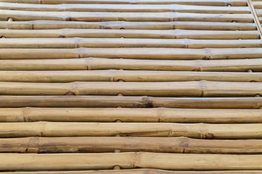 NATURAL MATERIAL MADE OF BAMBOO AS ABACKGROUND