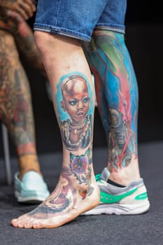 Krakow, Poland -  June 11, 2022: Unidentified  participant at 15th Tattoofest Convention in Cracow. One of the most prestigious tattoo festivals.