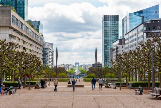 Esplanade du Charles de Gaulle in La Defense District, view East to the Arc de Triomphe, Paris, France