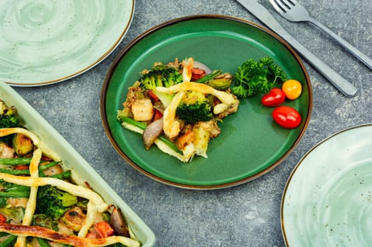 Savoury meat pie with brussels sprouts, pumpkin and broccoli. Autumn recipe.