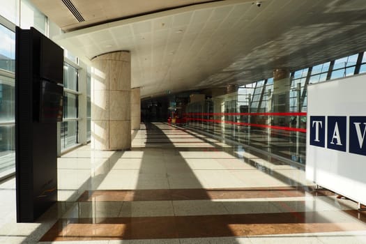 Ankara, Turkey, Esenboga Havalimani Airport, 01.18.2023 lobby or corridor at the airport for the transit of passengers who have passed screening. Airport interior. Glass windows and sunlight. Turkiye