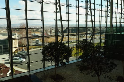Ankara, Turkiye, Esenboga Havalimani Airport, 01.18.2023 lobby or corridor at the airport for the transit of passengers. Airport interior. Glass windows. Street, sunny weather and airport buildings