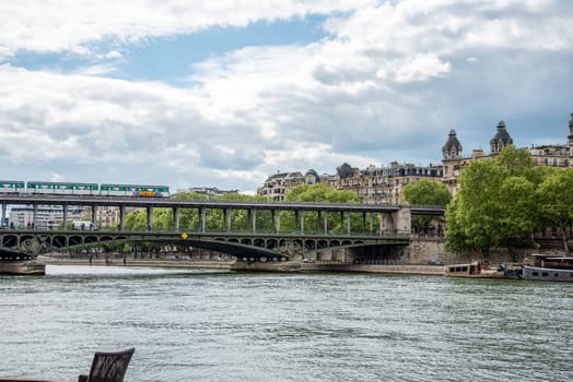 A metro crossing the bridge Bir Hakeim over the Seine in Paris, France