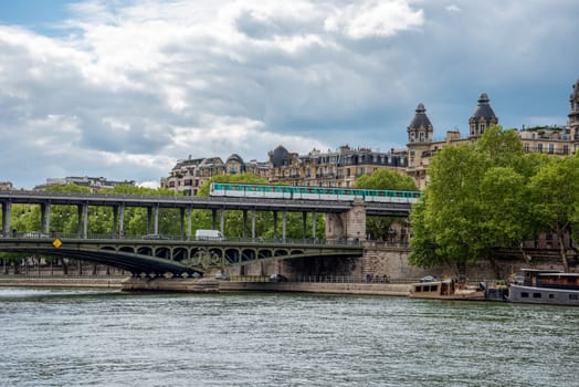 A metro crossing the bridge Bir Hakeim over the Seine in Paris, France