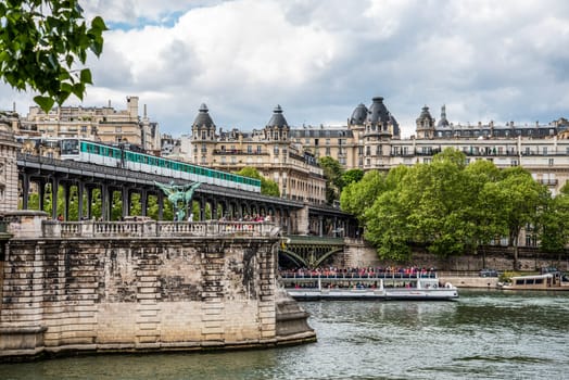 A metro crossing the bridge Bir Hakeim over the Seine in Paris, France