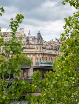 A metro crossing the bridge Bir Hakeim over the Seine in Paris, France