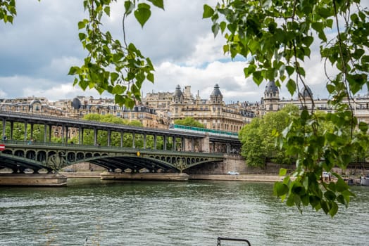 A metro crossing the bridge Bir Hakeim over the Seine in Paris, France